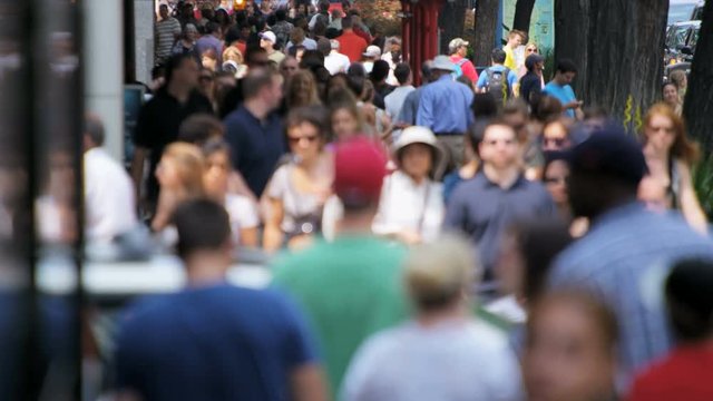 Chicago - April 2017: City people walking over pedestrian vehicle crossing on busy streets in summertime Chicago Illinois USA slow motion RED EPIC