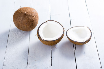 coconuts on white wood table background