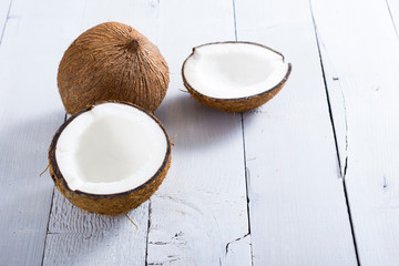 coconuts on white wood table background