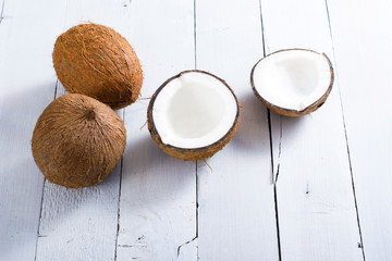 coconuts on white wood table background