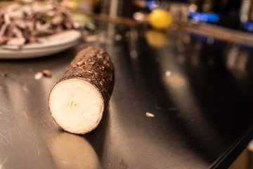 Yucca cut in half in a kitchen.