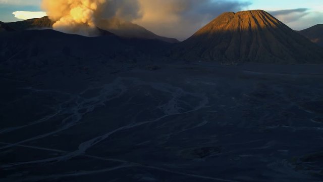 Mt Bromo summit at sunrise an active volcano eruption Java Indonesia