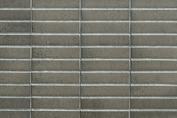 Modern grey brick wall background texture