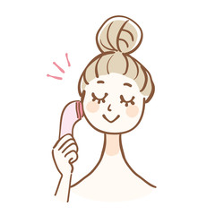 美顔器を使う女性