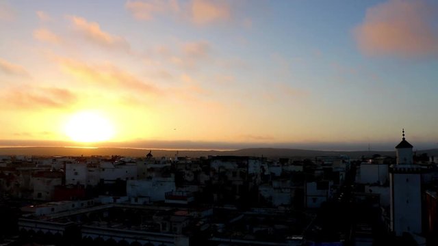 glorious sunrise captured from rooftop in Essaouira Morocco
