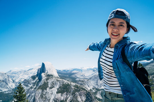 Happy Girl Hiker Taking Selfie On Top Of Mountain