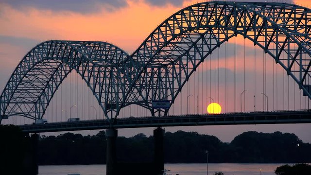 Sunset view of the Memphis Road Bridge in Southern Tennessee on Interstate 40 across the Mississippi River USA 