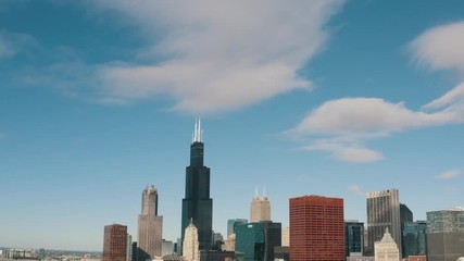 Drone aerial of Chicago downtown city skyline with large urban buildings