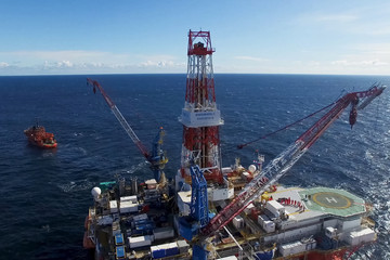 Oil offshore platform in the sea. Extraction of oil on the shelf