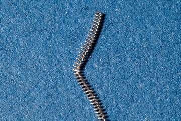 tungsten filament on a blue background is on the table