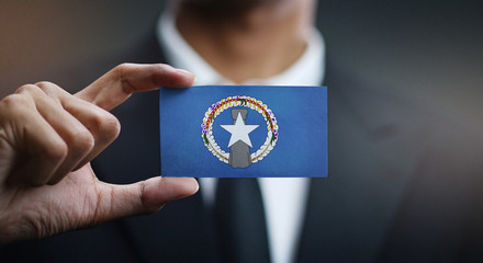 Businessman Holding Card Northern Mariana Islands Flag © natanaelginting
