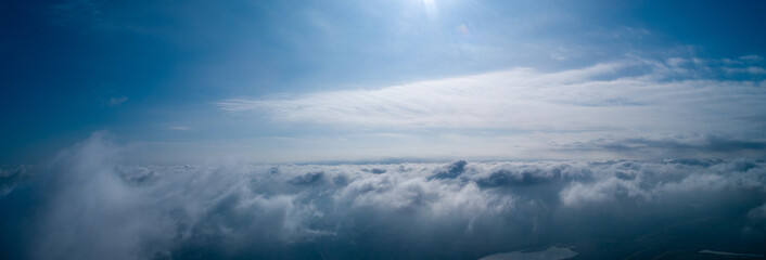 Obraz na płótnie Canvas Above the clouds, panoramic photo