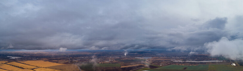 Obraz premium View from the height of the city through the clouds