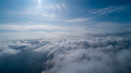 Fototapeta na wymiar Above the clouds, panoramic photo