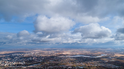 View from the height of the city through the clouds