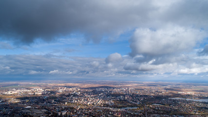 View from the height of the city through the clouds