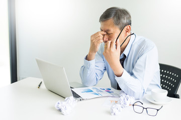 Depressed failure and tired businessman late sad and solving problem in office. in meeting room....