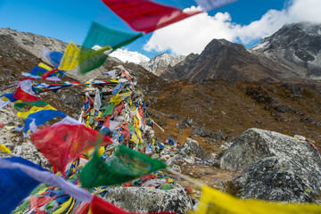 Prayer flags and mount Ama Dablam, beautiful view from Khumbu valley, Solukhumbu, way to Everest base camp - Sagarmatha national park - Nepal