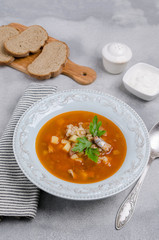 Traditional tomato fish soup