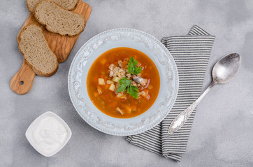 Traditional tomato fish soup