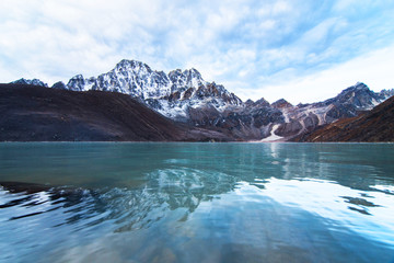 Beautiful Gokyo lake with mountain range in background,travel Nepal