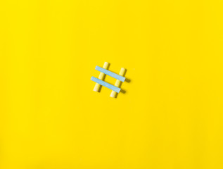 hash symbol on yellow background