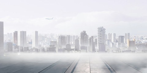 Obraz premium Foggy modern city . Mixed media