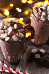 glasses with cacao and marshmallow topping
