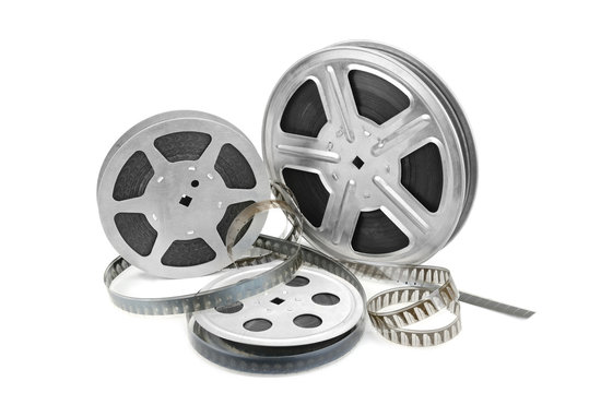 Old film in metal reels isolated on white