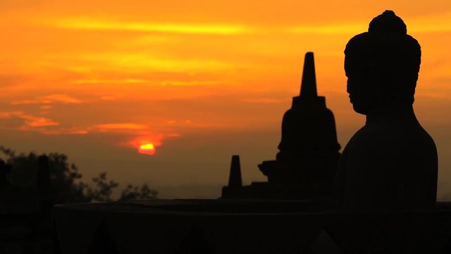 Borobudur at sunrise a stone monument a temple to Buddhism Java Indonesia
