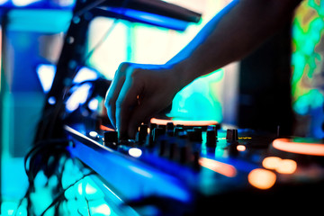 Dj playing disco house progressive electro music at the concert