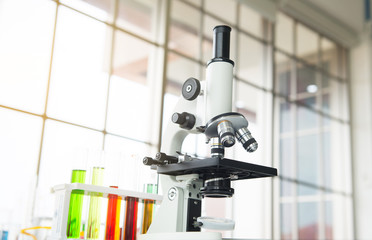 Picture of microscope with metal lens for research and medical equipment in laboratory