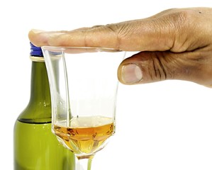 stop drinking New Year's resolution with hand over glass