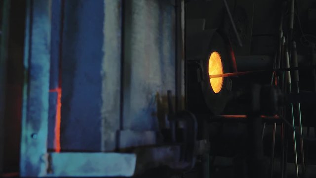 glassblower working in the workshop