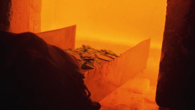 glassblower working in the workshop