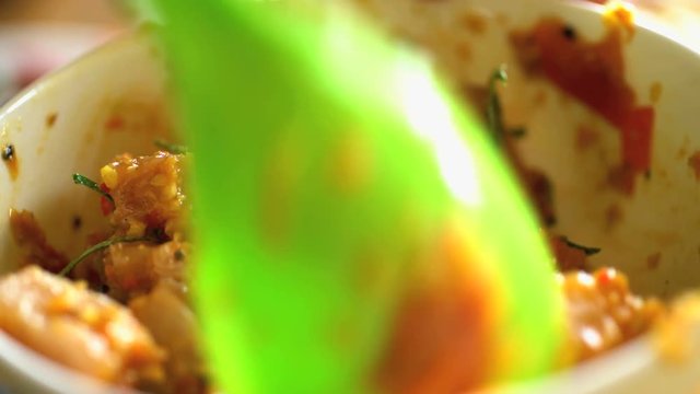 Healthy white Mahi Mahi fish local to Bali chopped uncooked and skinless in bowl with Basa gede