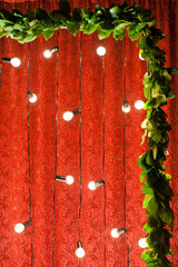 garland of lamps as a decoration in the restaurant at a wedding dinner