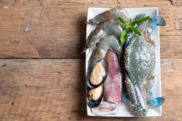 Raw seafood includes crabs, shrimp, clams, mussels and squids
