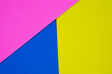 Multi coloured corrugated paper texture, use for background. vivid colour with empty space for add text or object.