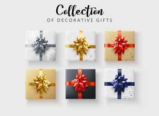 Set of colorful decorative gifts with satin bow isolated on white.