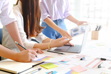 Business team consult with tablet and computer in office.