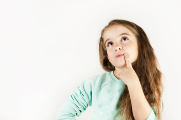Fototapeta premium bright beautiful girl emotionally posing on an isolated turquoise background