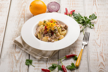 gnocchi with tuna onion and orange grated peel