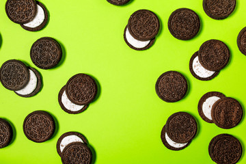 Oreo cookies, Chocolate cream filling sandwich cookies on a green background - 236409990
