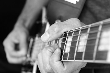 Gitarrist, Finger auf der Griffbrett