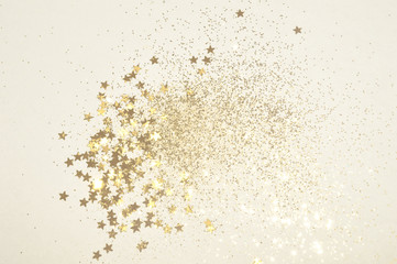 Golden glitter and glittering stars in vintage colors