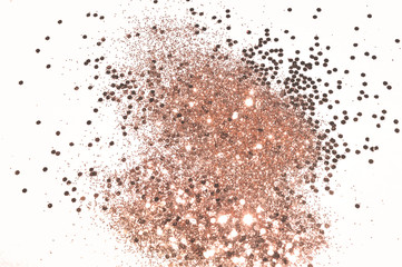 Rose gold glitter on white background in vintage nostalgic colors
