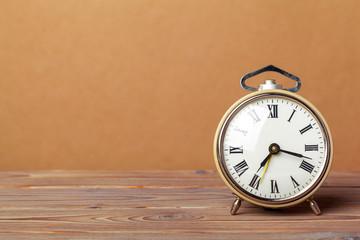 retro alarm clock on table
