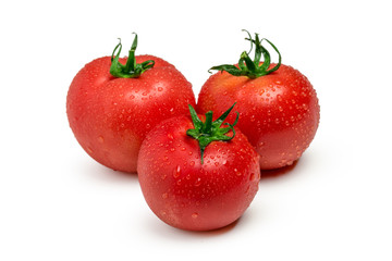 Three ripe  tomatoes isolated on white background