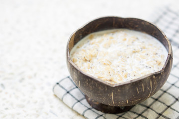 Oatmeal in coconut bowl